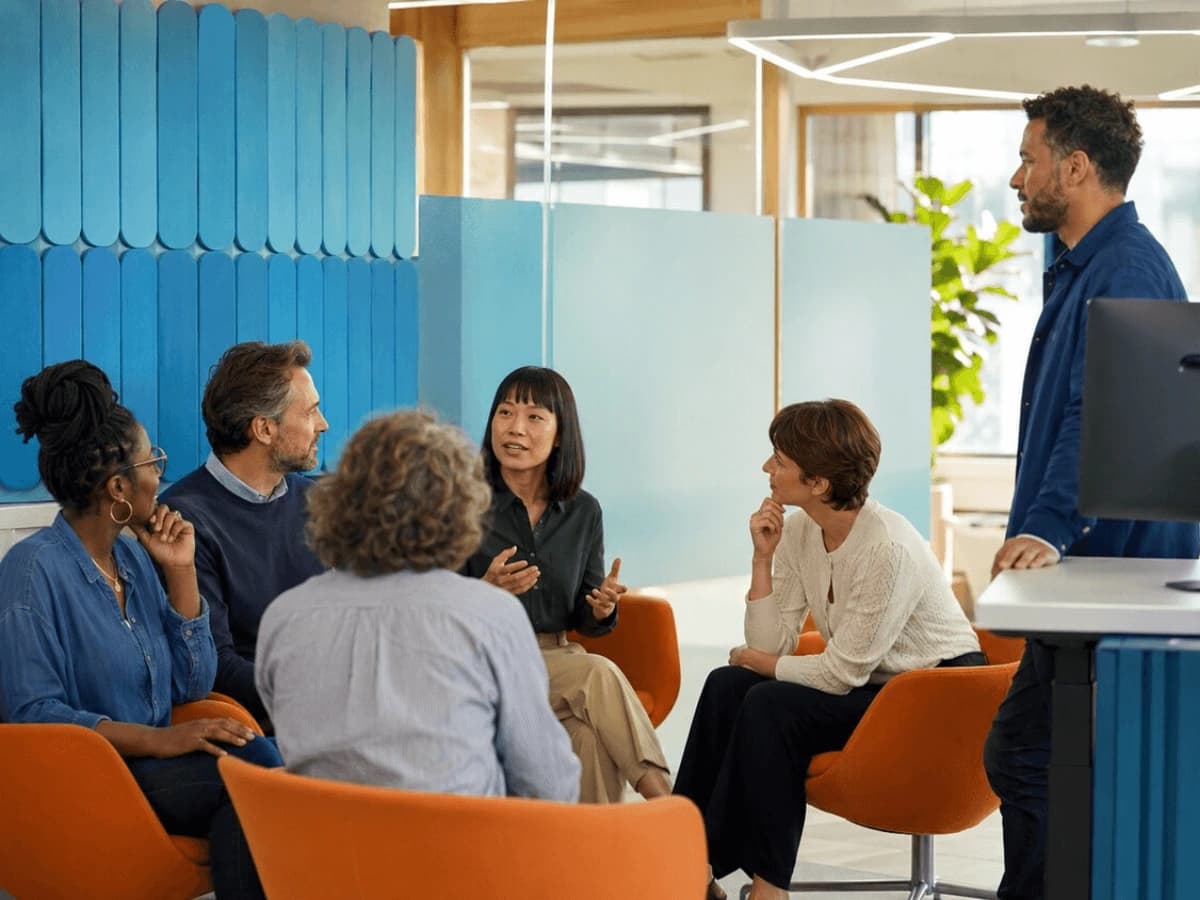 a group of people having a conversation